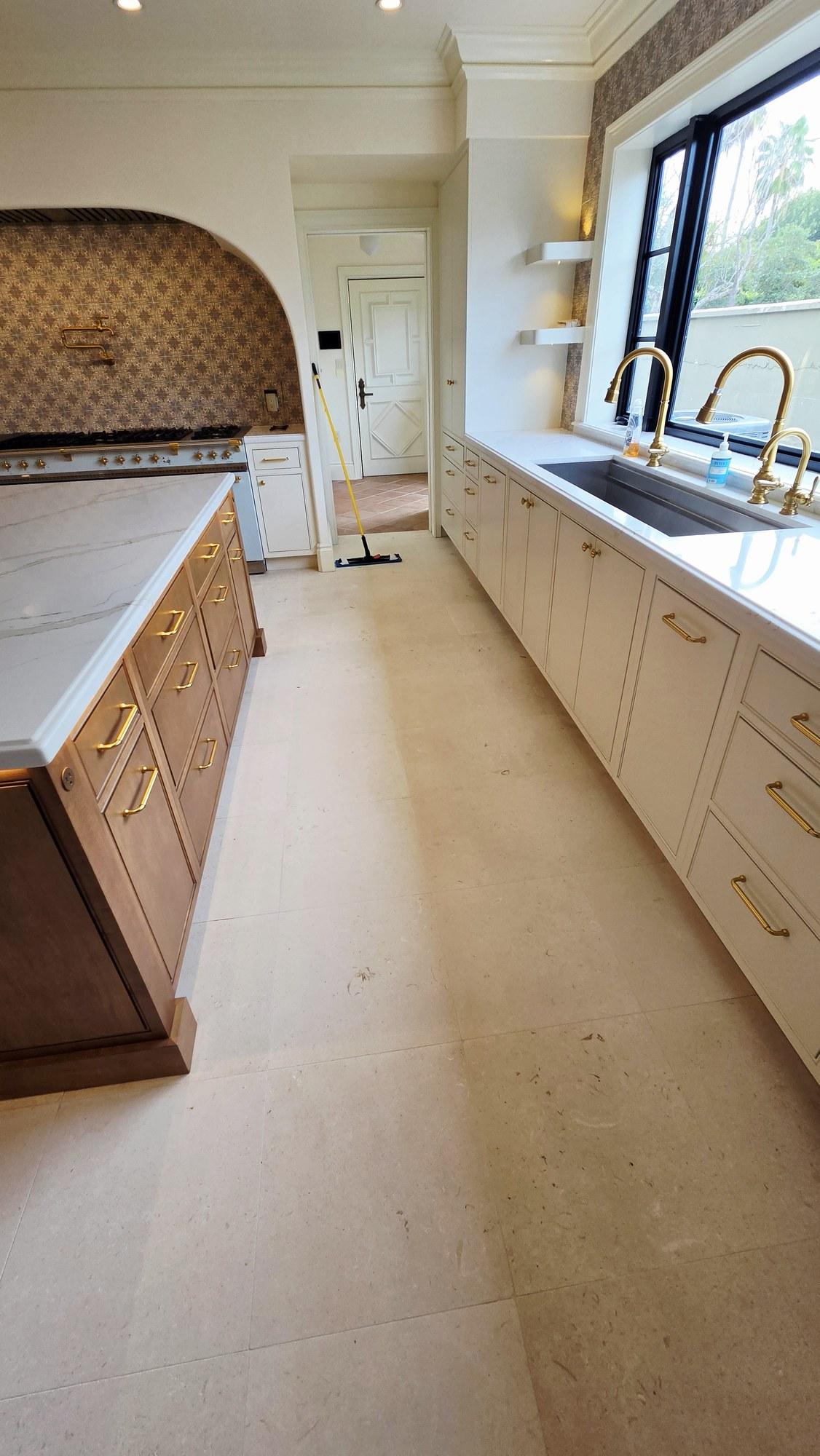 Shellstone Kitchen Floor in Miami Beach, After Haze Removal Shellstone kitchen floor in a Miami Beach home after low moisture haze removal, the surface even and clear with no coating applied