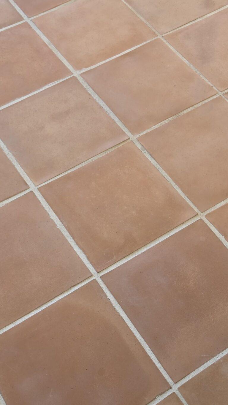 Close-up of real terracotta floor tiles and grout in a Miami Beach home