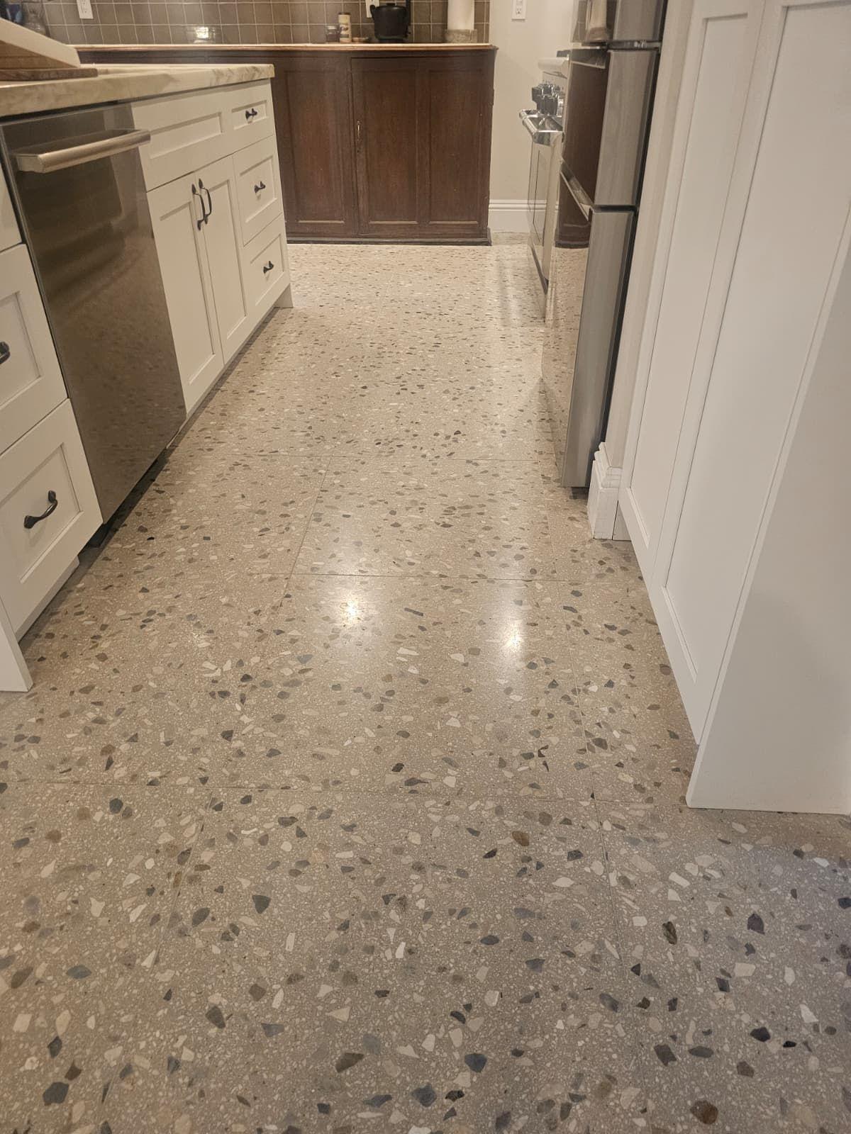 The same Coconut Grove kitchen terrazzo after the missing grout was filled, polished and sealed