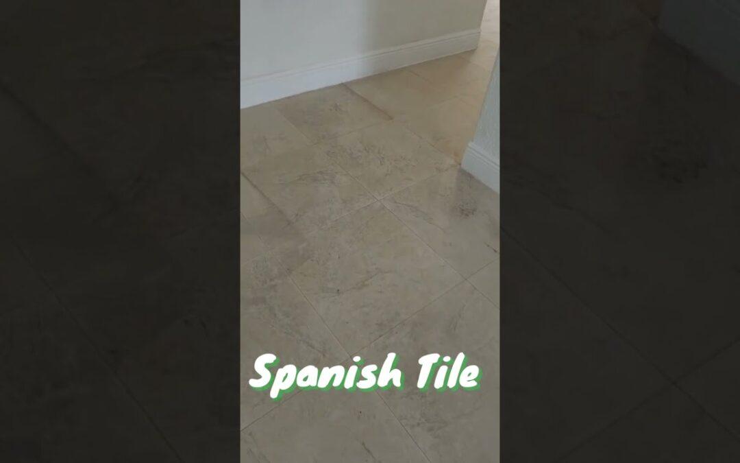 Failing acrylic sealer on a porcelain tile floor in Cutler Bay, before stripping